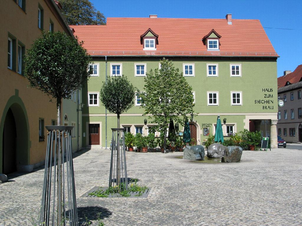 Wasserspiel Spucken und Schlucken